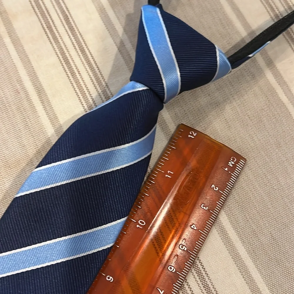 Like new navy and light blue striped zip tie